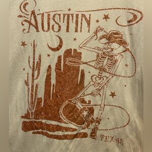 $7 or 2/$10 tshirt sale: Zoe + Liv Graphic Austin Texas Skeleton Cowboy tshirt